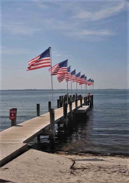 pier with american flags
